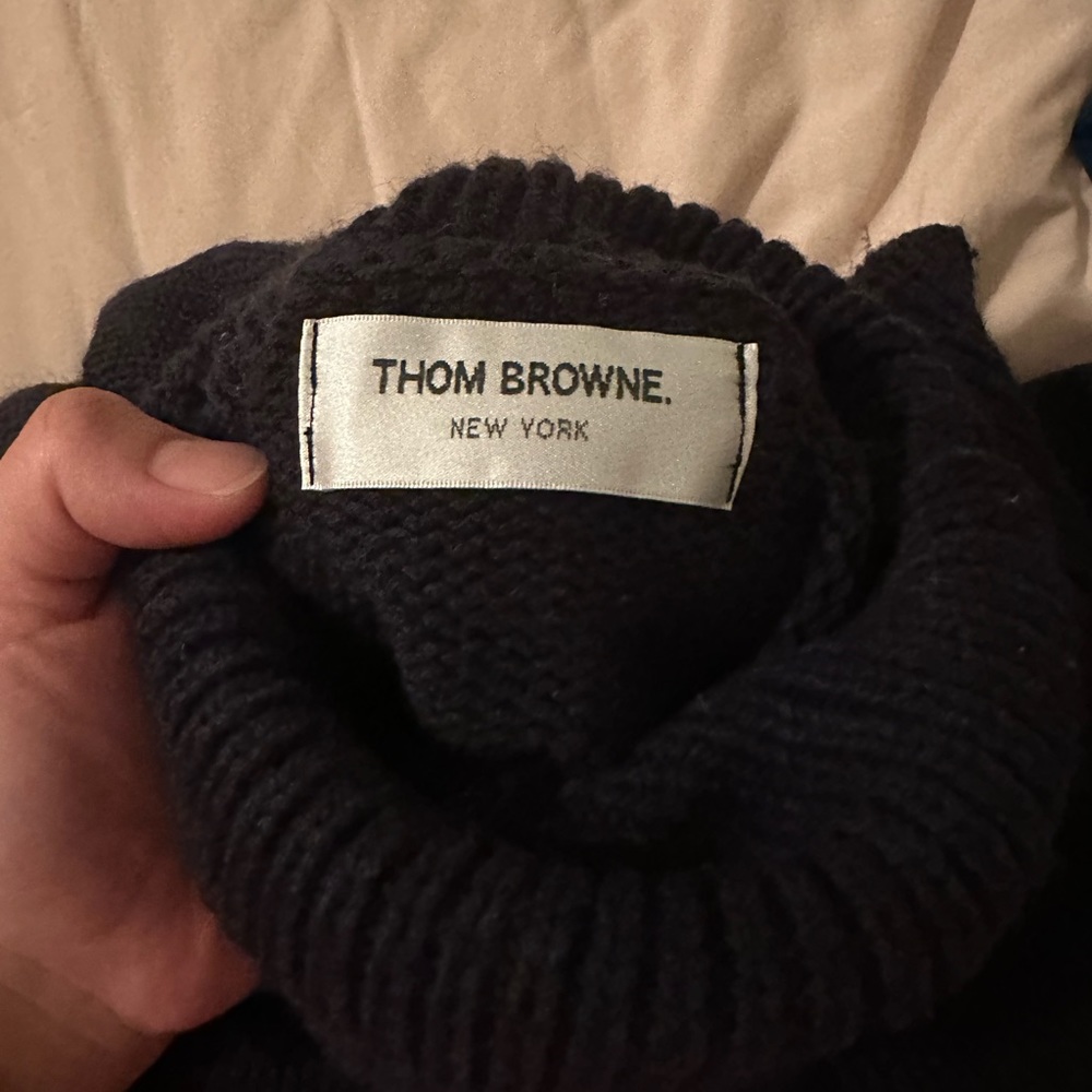 Thom browne turtle neck sweater.